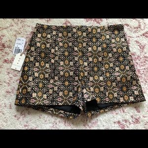 Forever 21 metallic gold and black shorts